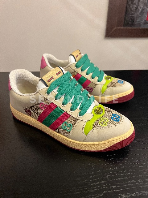 Scarpe Gucci in tessuto e pelle